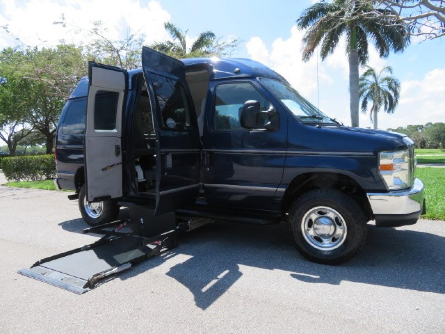 2011 Dark Blue /Gray Ford E-Series Wagon E-350 XLT Super Duty (1FBNE3BS4BD) with an 6.8L V10 SOHC 20V engine, located at 4301 Oak Circle #19, Boca Raton, FL, 33431, (954) 561-2499, 26.388861, -80.084038 - You are looking at a Gorgeous 2011 Ford Econoline E350 XLT Norcal Max High Top Handicap Wheelchair Conversion Van with 6.8L V10, 15K Original Miles, 9 Inch Lowered Floor, Braun UVL Side Entry Wheelchair Lift, Remote Control Power Side Entry Doors, Expanded Side Entry Doors, Q Straint Tie Down, Syste - Photo#47